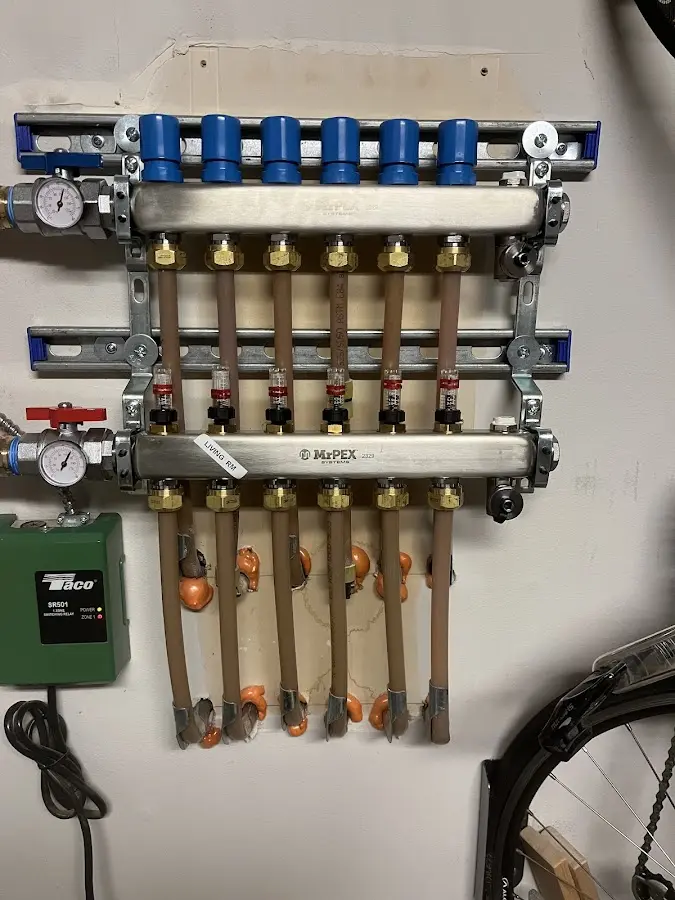 Plumber performing Leak Detection at a residential property in Uhrichsville